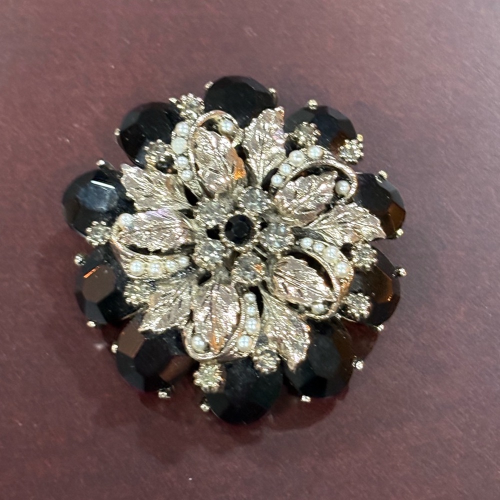 Elegant Black and Silver Floral Brooch